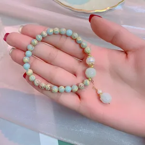 Elegant retro style gemstone beaded bracelet with pearl and pendant for women accessory.