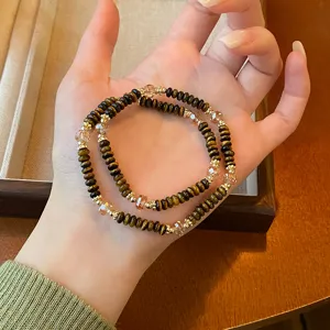 Bracelet perles oeil de tigre vintage double couche elegant bijoux de main pour femmes chic