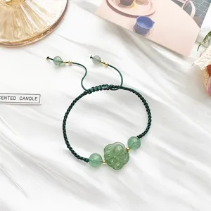 Bracelet tressé en cristal vert avec pendentif patte cordon réglable bijoux femme.
