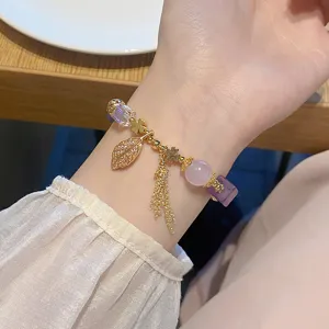 Retro sweet purple crystal bracelet with pave leaf pendant, tassel and clover charms for women.