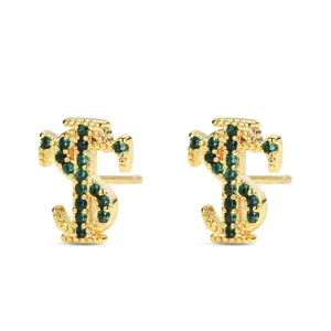 Gold dollar sign stud earrings featuring sparkling green zircon stones for hip hop fashion style.