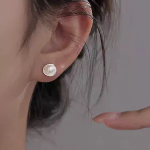 Chic shell pearl stud earrings for women, stylish geometric metal texture lightweight daily wear.