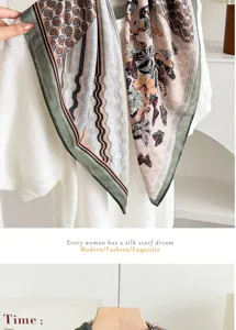 Detailed shot of vintage paisley butterfly print square scarf with elegant green border design.