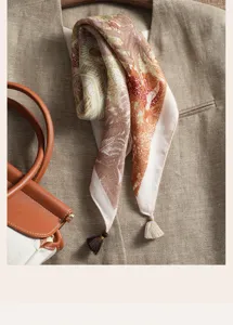 Detailed view of the vintage paisley pattern cotton linen square scarf with fine tassels.
