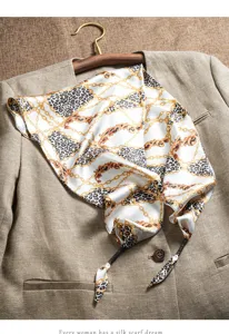 Elegant women's silk scarf featuring luxury chain and leopard print design, perfect chic accessory.