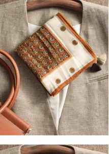 Linen-feel small square scarf with elegant geometric print and chic tassel details.
