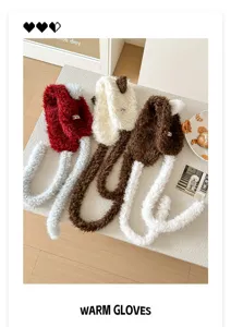Plush cat ear earmuffs detail shot, warm winter outdoor ear warmers with long hanging straps.