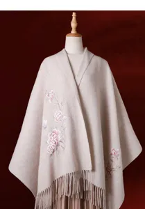 Elegant beige wool cashmere shawl cape with exquisite pink peony floral embroidery and fringe.