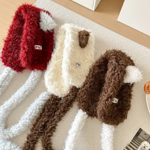 Cute plush winter earmuffs for women, warm fluffy ear warmers in red, beige and brown colors.