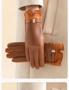 Brown leather and suede winter gloves detail, warm touchscreen gloves with chic metal buckle.