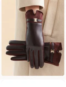 Detail shot of women winter touch screen gloves suede and leather warm brown elegant