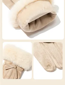 Detalle de guantes de invierno térmicos de ante sintético con puño de pelo sintético y bordado.
