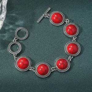 Boho vintage antique silver bracelet with red cracked stone round bezels and toggle clasp detail.