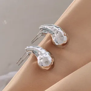 Silver irregular drop stud earrings, minimalist chic metallic jewelry for women daily wear.