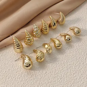 Gold teardrop hammered earrings set, stylish metallic stud earrings for women daily wear.
