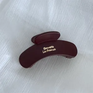 Matte large hair claw clip for thick hair, elegant deep red cloud shark clip with gold print.