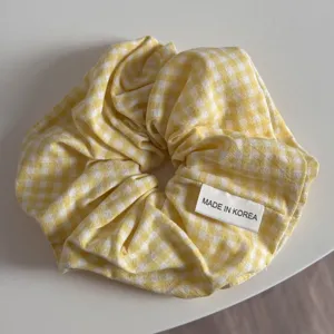 Yellow and white plaid hair scrunchie, sweet preppy style fabric hair tie for daily wear.