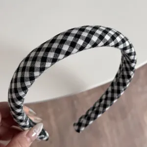 Classic black and white gingham headband, fabric wrapped sponge hair hoop daily accessory detail view.