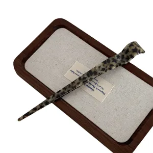 Elegant acetate hair stick for women, stylish tortoiseshell pattern bun maker for daily wear.
