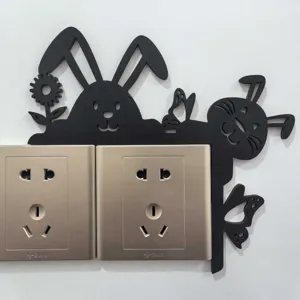Wooden Easter bunny switch wall decor detail, cute black cartoon rabbit sticker for home wall corner.