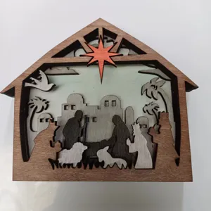Détail de la crèche en bois, ornement de table de Noël superposé en 3D et figurines de silhouette vue.
