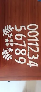 Wooden number cutouts and leaf heart star shapes for baby monthly milestone photo props.