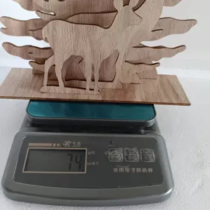 Décoration de table de cerf de Noël en bois, ornement d'élan creux pour les fêtes.