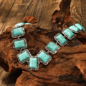 Detail view of bohemian retro turquoise square pendant necklace, ethnic style clavicle chain.