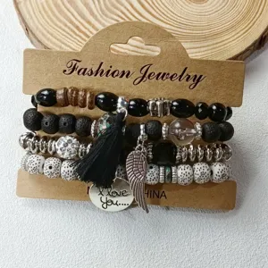 Boho multi-layer beaded bracelet set with tassel and wing charms, vintage stackable jewelry.