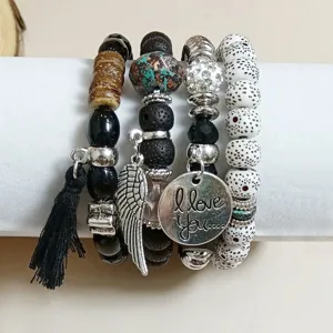Bohemian multi-layer stacked beaded bracelet set with tassel and wing charm for women vintage style
