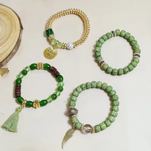 Vintage bohemian green gold beaded bracelet set elastic stackable fashion jewelry detail view