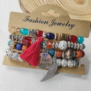 Bohemian multi-layer beaded bracelet set with red tassel and love charm for daily wear.