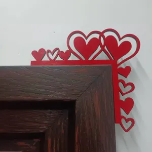 Wooden red heart door corner decoration detail view for festive home decor and holiday layout