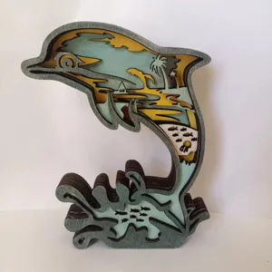 Wooden 3D dolphin desktop ornament, multi-layered carved ocean theme home decor sculpture.