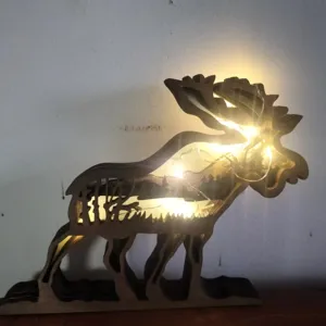 Wooden carved elk desktop ornament with warm LED lights for Christmas holiday home decor.