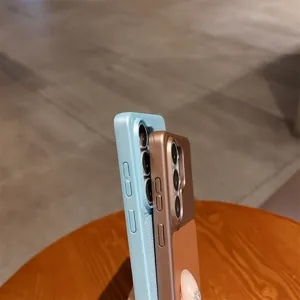 Detailed view of leather-textured phone case with precise camera cutouts and sturdy frame.