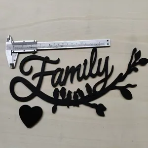 Wooden Family wall decor detail shot with measurement caliper, black bird branch sign for home.