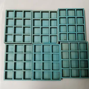 Wooden miniature grid shelf for jewelry and mineral specimen storage display detail view.