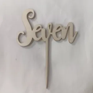 Wooden Seven cake topper detail shot, natural wood texture, perfect for birthday party decor.