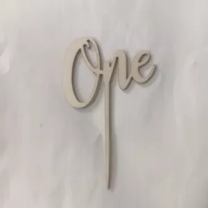 Wooden One cake topper for first birthday party decoration, wooden script letter cake insert detail.