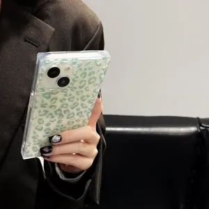 Transparent green leopard print phone case detail, stylish square glossy protective cover.