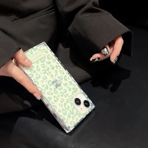 Transparent green leopard print phone case, square glossy protective cover for iPhone detail view.