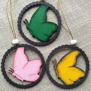 Handmade wooden butterfly hanging ornaments, colorful Easter decorative pendants for home.