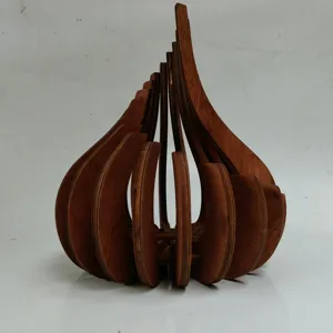 Wooden candle holder detail shot, creative lotus layered design, natural decor craft piece.