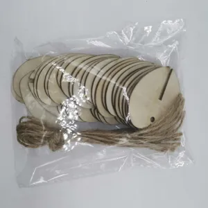 Unfinished wooden slices tags with jute twine for DIY crafts and holiday decoration.