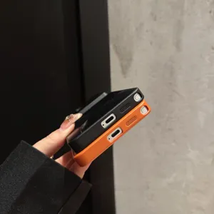 Custodias protettiva per Samsung Galaxy Ultra, cover ibrida anti-caduta, nero e arancione.
