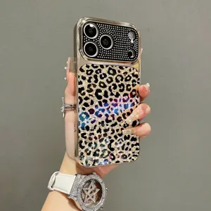 Leopard print rhinestone phone case detail showing sparkling camera bezel and luxury gold frame.