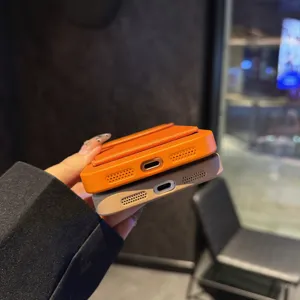 Magnetic leather phone case with card holder and stand, compatible for iPhone models.