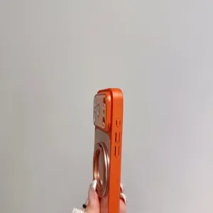 Detail view of orange magnetic phone case with 360-degree rotating ring stand.