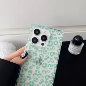 Close-up of clear green leopard print phone case detail, stylish square glossy design.